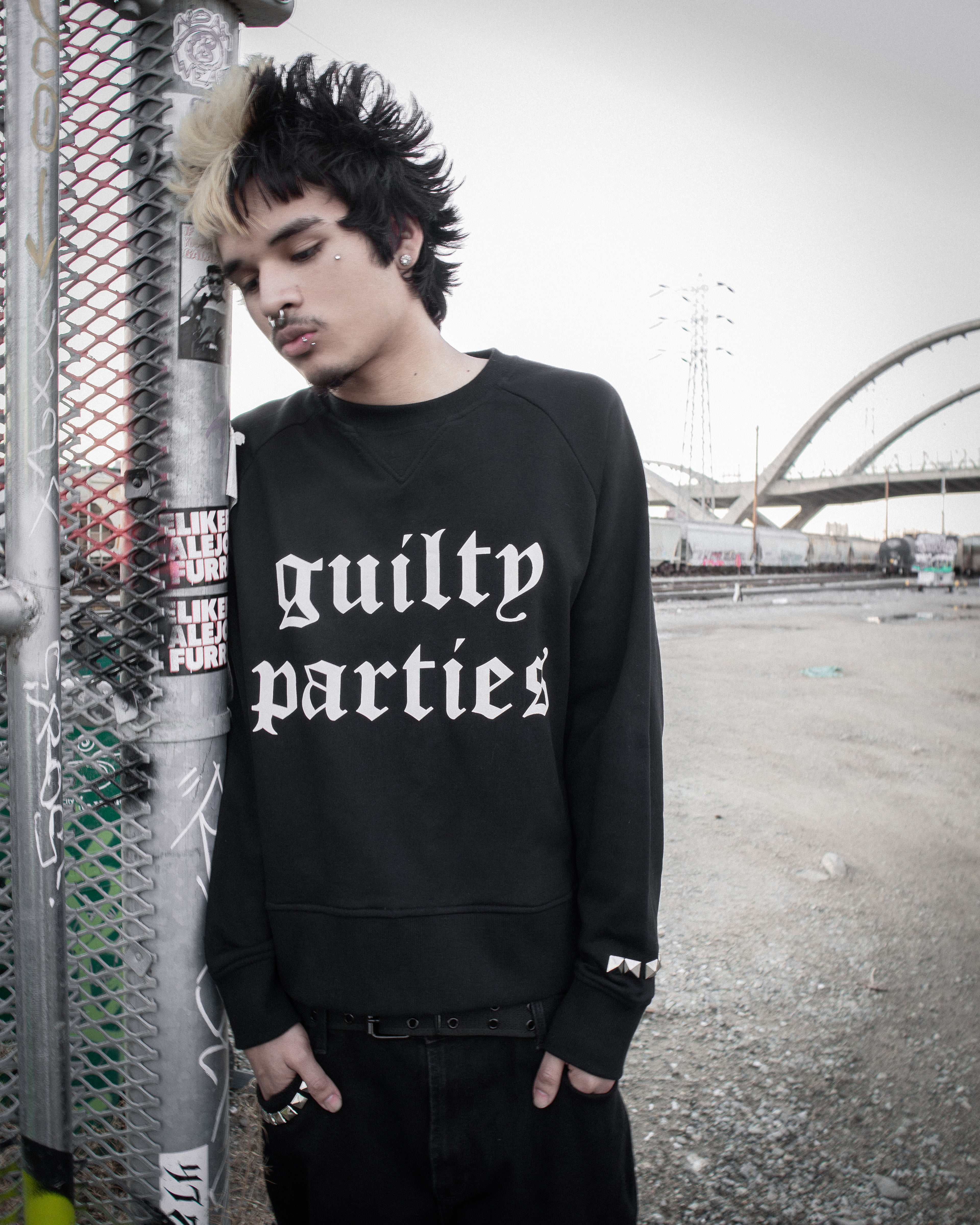‘guilty parties’ sweater
